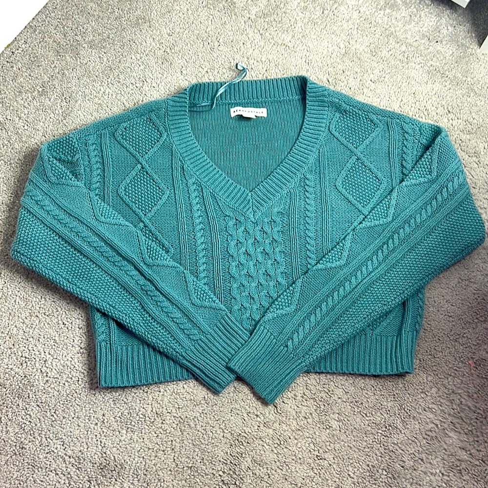 Green long sleeved cropped sweater